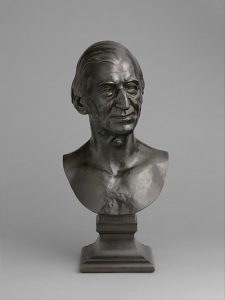 A metal bust of Ralph Waldo Emerson