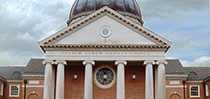 a building with columns and a dome